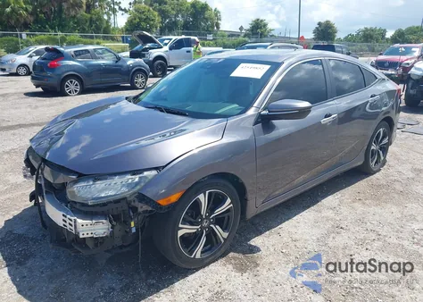 2016 Honda Civic Touring z USA, uszkodzony, nr VIN 19XFC1F95GE030111